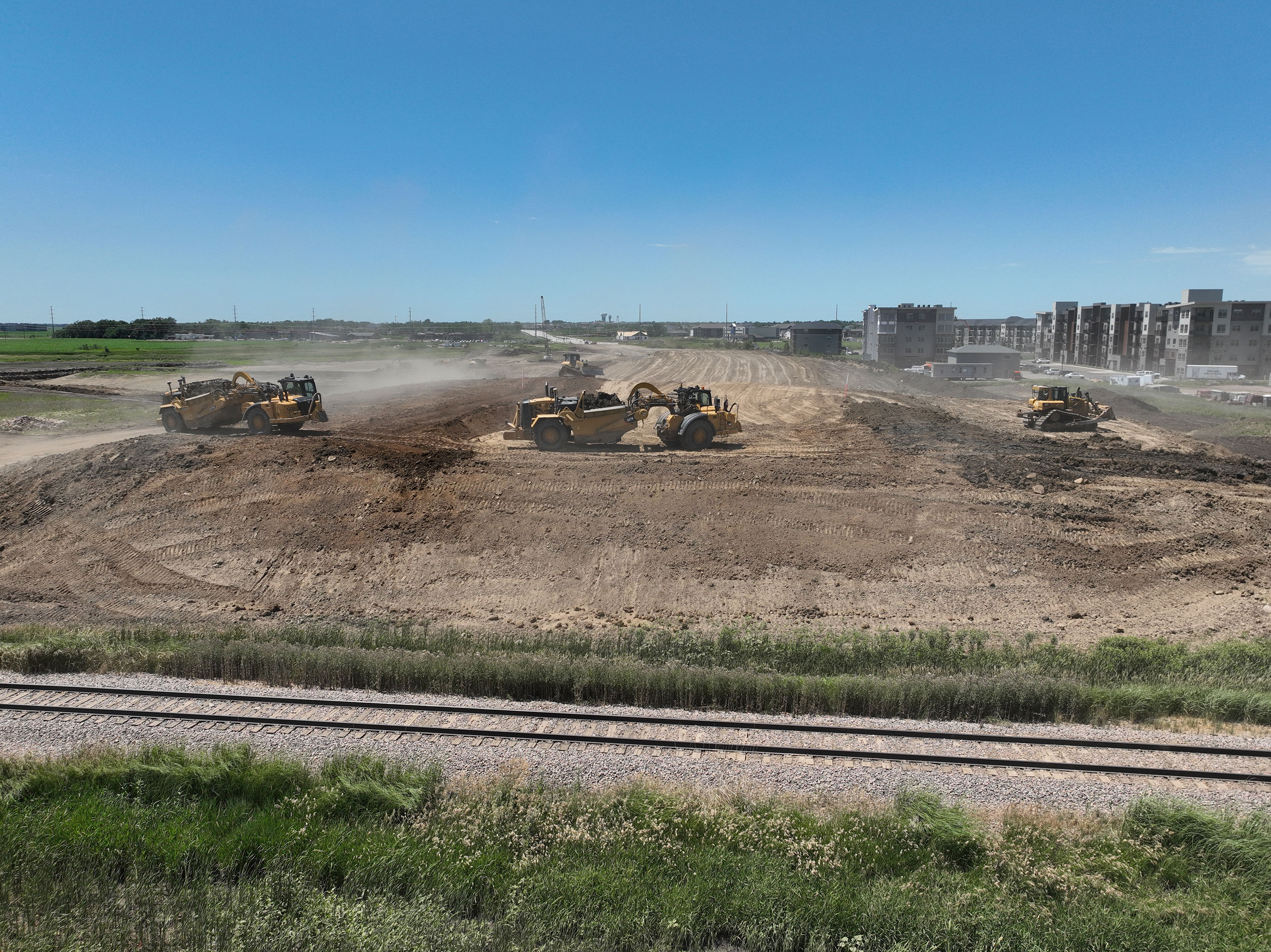 Bulldozers moving dirt.