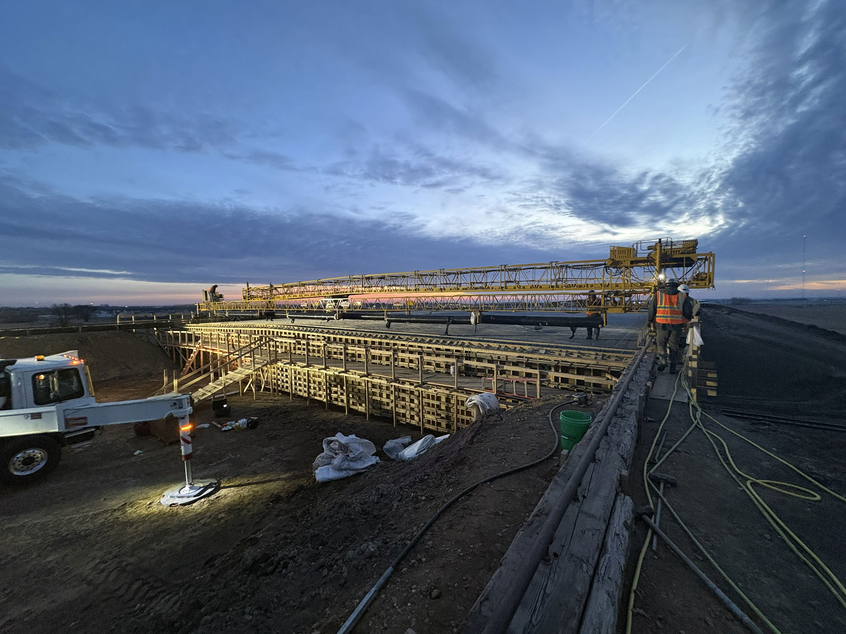 Crane on foundation of structure.